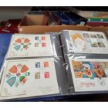 A large collection of GB FDC'S in albums