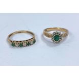 A 9 carat hallmarked gold cluster ring set diamonds and emeralds; a 9 carat hallmarked gold ring set