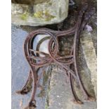 A large metal sash clamp; a Victorian pair of cast iron bench ends; a fender