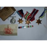 WWII:  a group of 4 medals with dispatch box addressed to Mr W Snelson, the entitlement slip