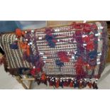 Two Persian flatwoven saddlebags with beaded and tasselled decoration
