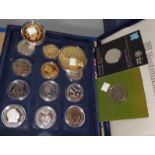 A collection of modern commemorative coins in presentation case