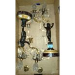 A pair of bronze and ormolu figural two branch candelabra lustres, two colour marble pedestal bases,