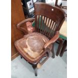 A 1930's oak armchair with ladder back, on turned legs (seat requires upholstering); an early 20th