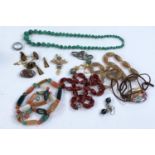 Hard stone necklaces, agate coloured and others, a malakite necklace, similar brooches etc some with