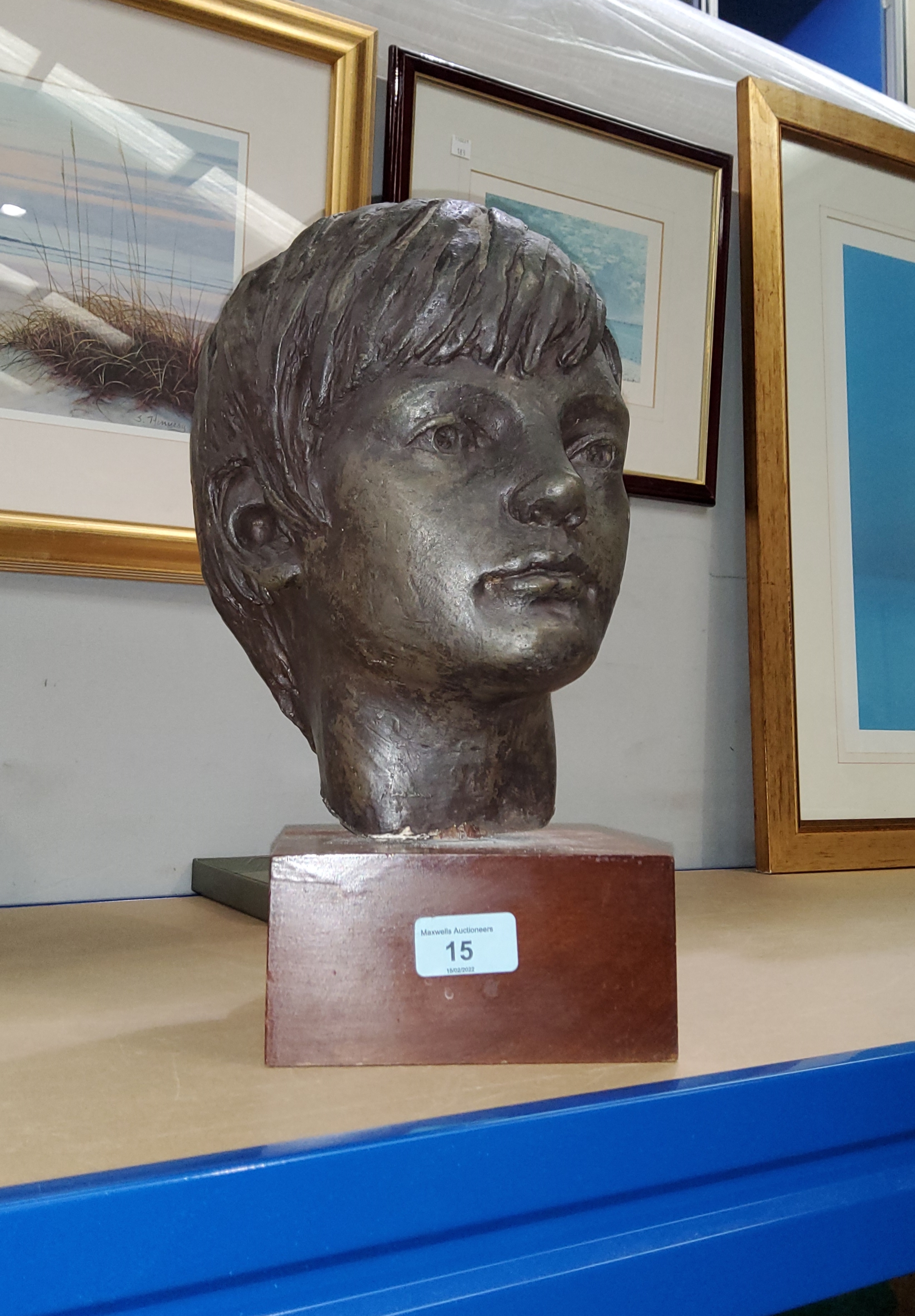 A portrait bust of a young man, mahogany base 37cm