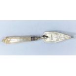 A hall marked silver and mother of pearl handled presentation trowel Sheffield 1878 length 19cm