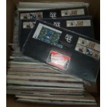 A large selection of Great Britain stamp presentation packs