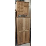 A pine small wardrobe with double doors; a pine chest of 5 drawers and cupboard