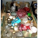 Three pieces of cranberry glass and a collection of scent bottles