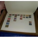 Two albums of stamps; an album of GB FDEC's; etc.