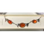 A modern 925 chain necklace set 3 cabochon amber beads