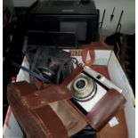 A selection of vintage cameras and accessories