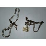 Two hall marked silver albert chains with fobs