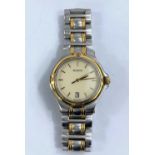 A two tone stainless steel and gilt GUCCI unisex wristwatch with swiss quartz movement, gilt