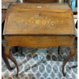 A late 19th/early 20th century floral marquetry inlay Bureau de Dam with inlay brass fittings,