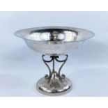 A hallmarked silver Arts & Crafts dish of planished circular form, raised on dome base and 3