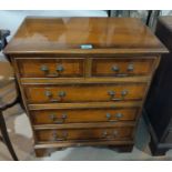 A mahogany dwarf reproduction chest of 3 long and 2 short drawers