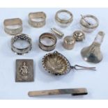 A pair of hallmarked silver napkin rings, 2 others, a hallmarked silver ruler etc. weighable