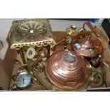 A 19th century copper kettle with brass trivet