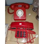 Two 1970's vintage red telephones
