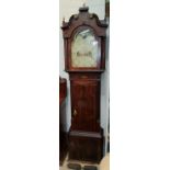 A late 18th century longcase clock in figured mahogany case with boxwood line and Sheraton motif