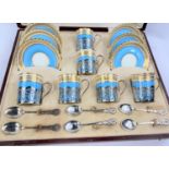 A CRESCENT bone china coffee set, the 6 cups with pierced silver galleries and handles, with