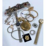 A selection of costume jewellery including watches, brooches etc