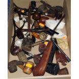 A collection of meerschaum and briar pipes; etc.