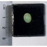 An oval cabochon cut opal, 1.13 carat