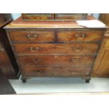 A Georgian mahogany large chest of 3 long and 2 short drawers with brass drop handles, on ogee