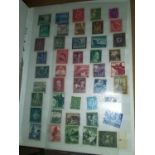 An album of German WWII era stamps.