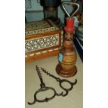 A novelty carved wooden bottle opener and two vintage corkscrews