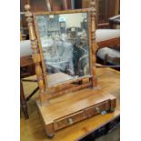 An early 19th century dressing table mirror in mahogany frame, with 2 drawers to base