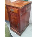 Two Edwardian desk pedestals/pot cupboards with raised figured panels