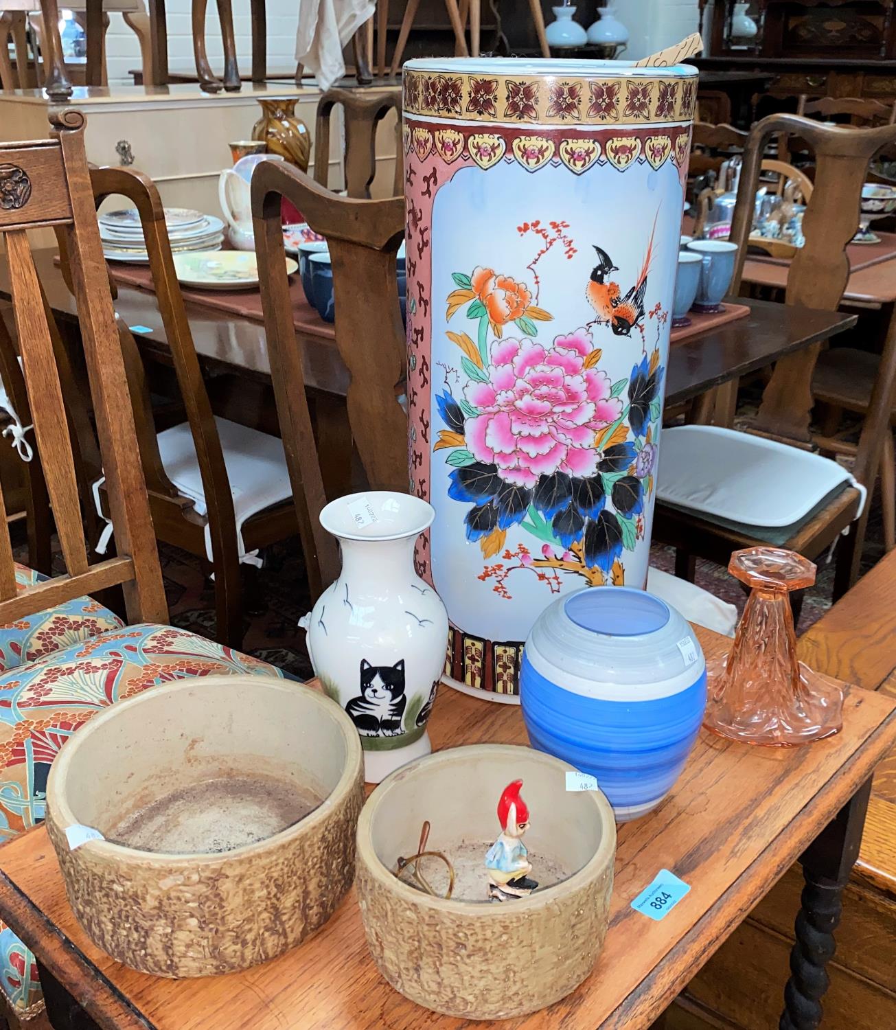 A modern Chinese ceramic stick stand decorated with birds and flowers and a jardiniere etc