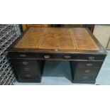 A large oak and mahogany partners pedestal desk three drawers to each pedestal and three drawers