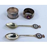 Four shipping silver plated items an enamelled napkin ring for the R.M.S Ranchi, two tea spoons