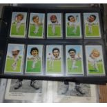 A selection of Topical Times Football cards, other cigarette sporting cards, a set of Copes