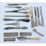 3 hallmarked silver combs, a selection of silver and other knives etc; a plated South American tea