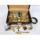 A jewellery box with 9 ladies watches; costume jewellery