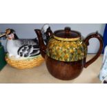 A large brown glaze barge tea pot and a ceramic egg crock in the form of a chicken (a.f)