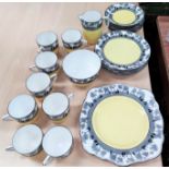 A part Foley tea service, yellow and grey, cups and saucers etc.