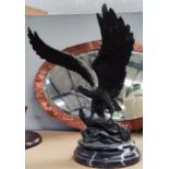 A Bronze Statue of an Eagle in Take Off, on a log which is on a marble base. Height 37cm