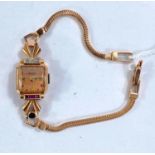 A lady's wristwatch and strap in rose tone yellow metal, stamped '14K', by Crawford, 16.7 gm gross