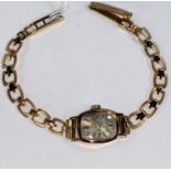 A ladies 9 carat hallmarked gold wristwatch, 10.8 gm gross