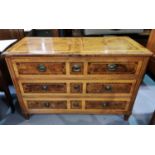 An 18th century German neo-classical commode chest of 3 drawers, quarter veneered walnut panels with