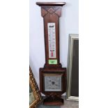 An aneroid inlaid wall hanging barometer and 4 prints