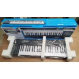 An Alesis Vi49 USB powered midi controller keyboard, boxed with original packaging