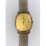 A gent's Marvin wristwatch on 9 carat hallmarked gold gate type strap